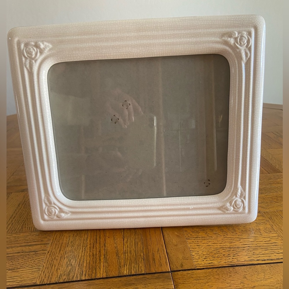 Cream colored crackled glass look picture frame.